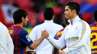 Barcelona's Lionel Messi and Real Madrid's Cristiano Ronaldo shake hands before a match in April 2012.