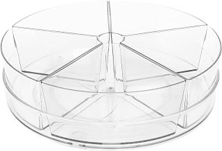 A clear round lazy susan organizer with removable compartments