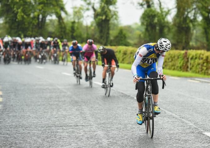 Riders attempt a breakaway from the peloton early in Stage 1
