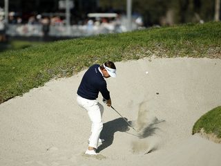 Keith Mitchell hitting a fairway bunker shot