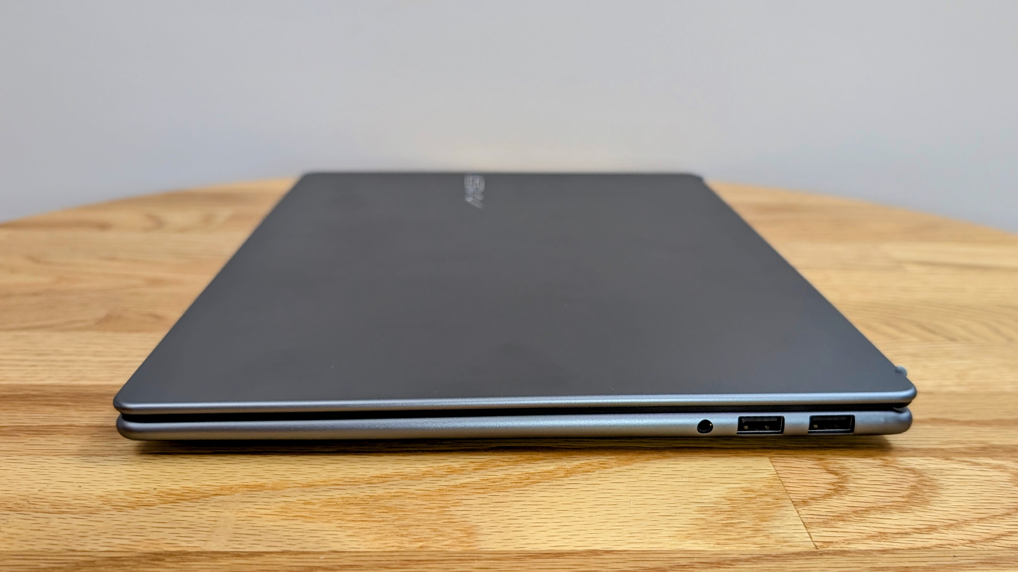 MSI Prestige 14 AI+ right hand side closed on a coffee table