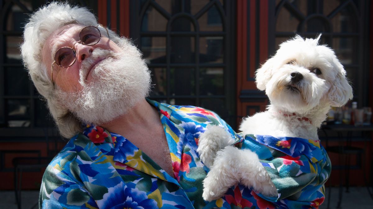 Man and his dog dressed the same