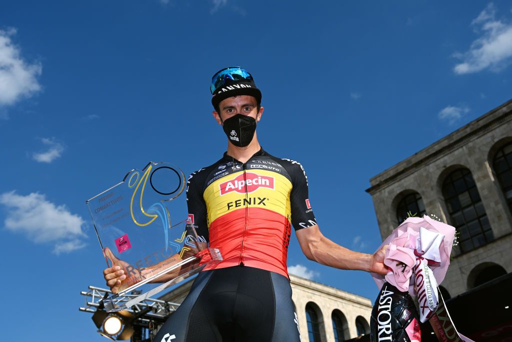 MILAN ITALY MAY 30 Dries De Bondt of Belgium and Team AlpecinFenix Most Combative Rider during the 104th Giro dItalia 2021 Stage 21 a 303km Individual Time Trial stage from Senago to Milano ITT Duomo di Milano Milan Cathedral Trophy UCIworldtour girodiitalia Giro on May 30 2021 in Milan Italy Photo by Stuart FranklinGetty Images