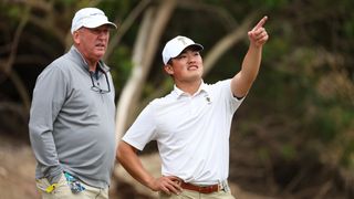 Bruce Heppler and Hiroshi Tai during the men's NCAA Division I Championship