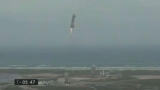 A view of Starship SN15 as it descends back to Earth in a May 5, 2021 test launch and landing.