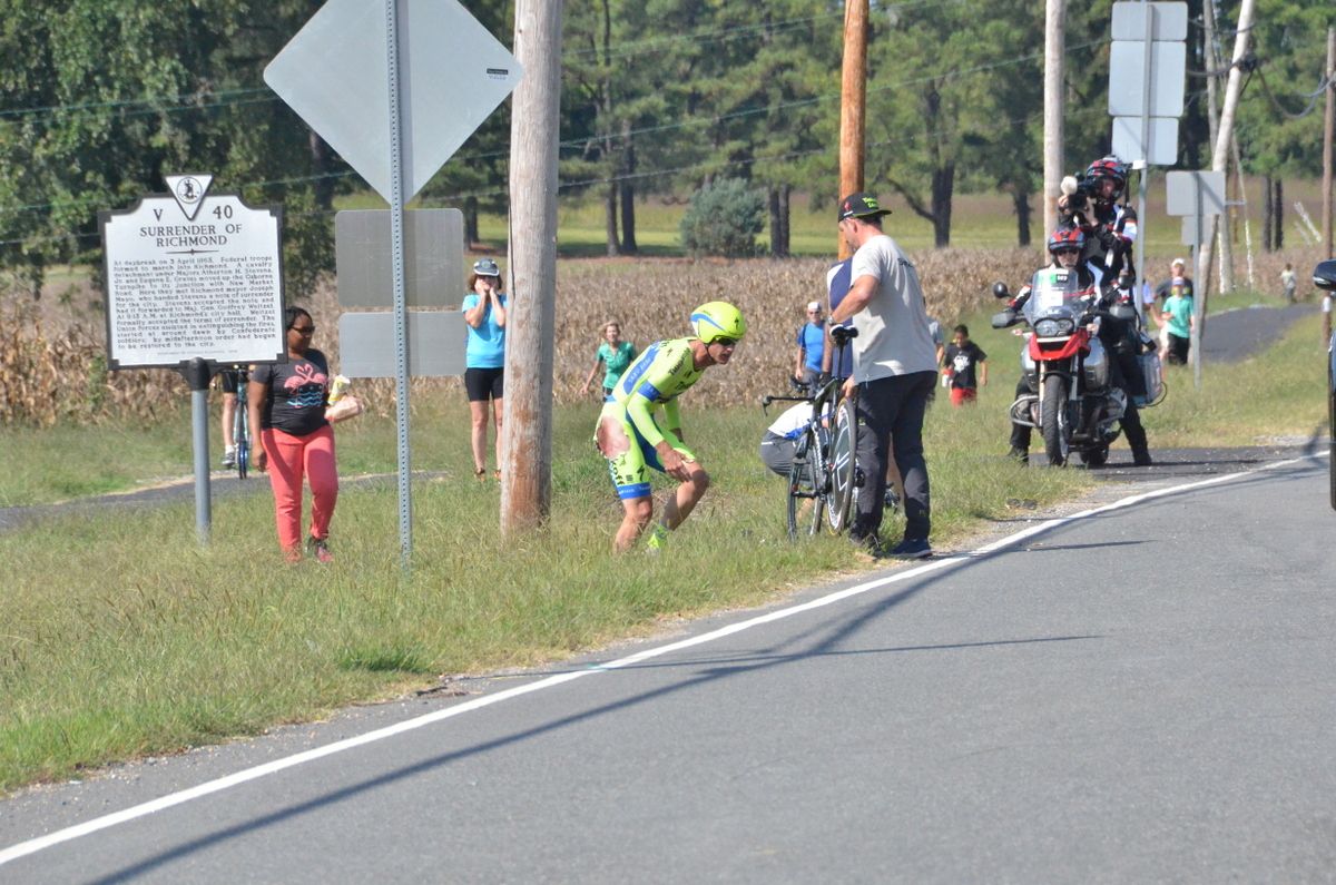 Michael Rogers emerges from the ditch he fell into