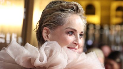 A handout picture released by the Red Sea International Film Festival (RSFF) shows veteran US actress Sharon Stone arriving on the red carpet during the opening ceremony in Saudi Arabia's Red Sea coastal city of Jeddah on December 1, 2022.