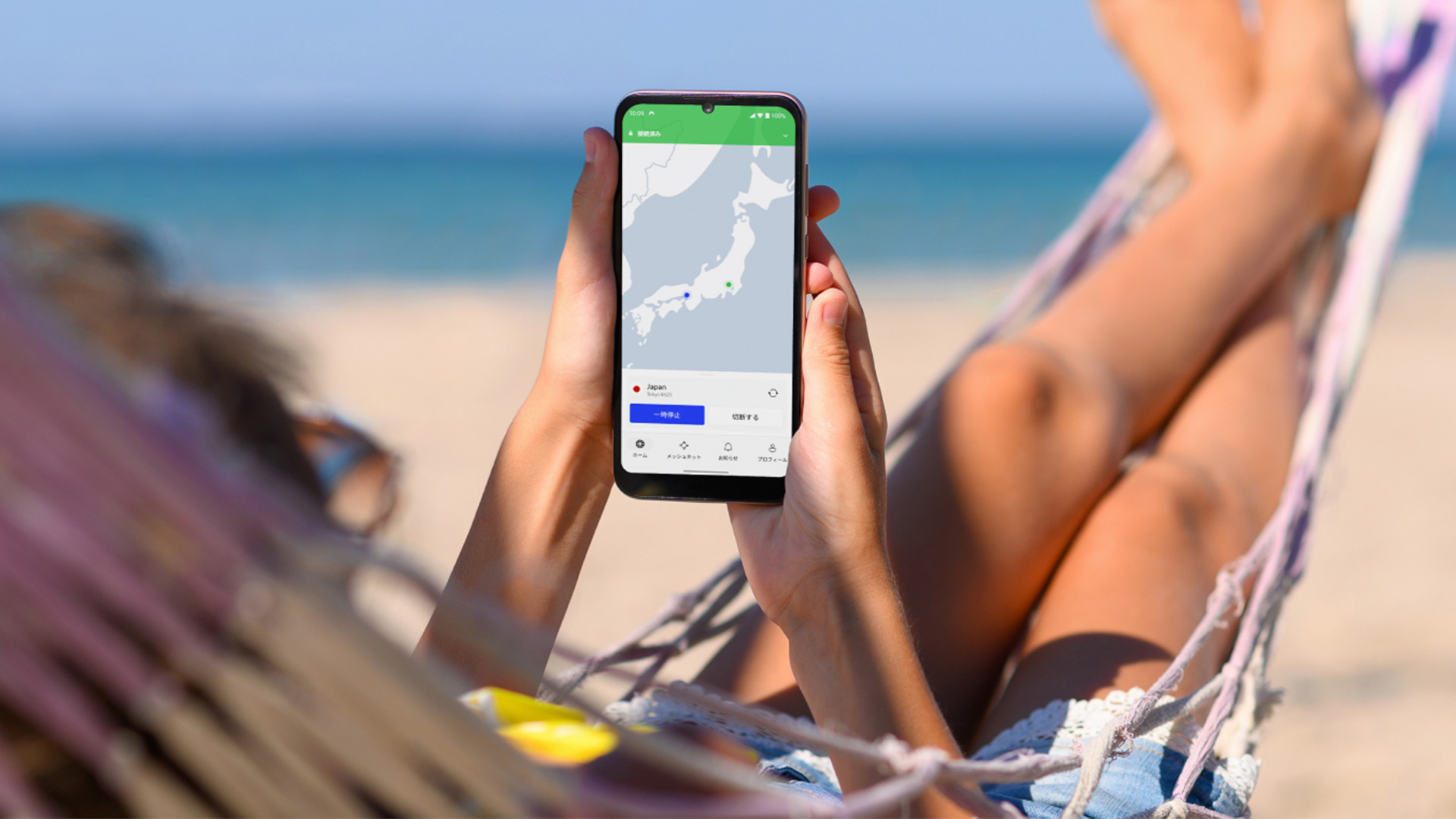 NordVPN app on mobile device, being used on the beach