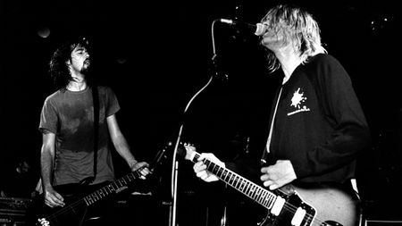 Krist Novoselic and Kurt Cobain performing live onstage