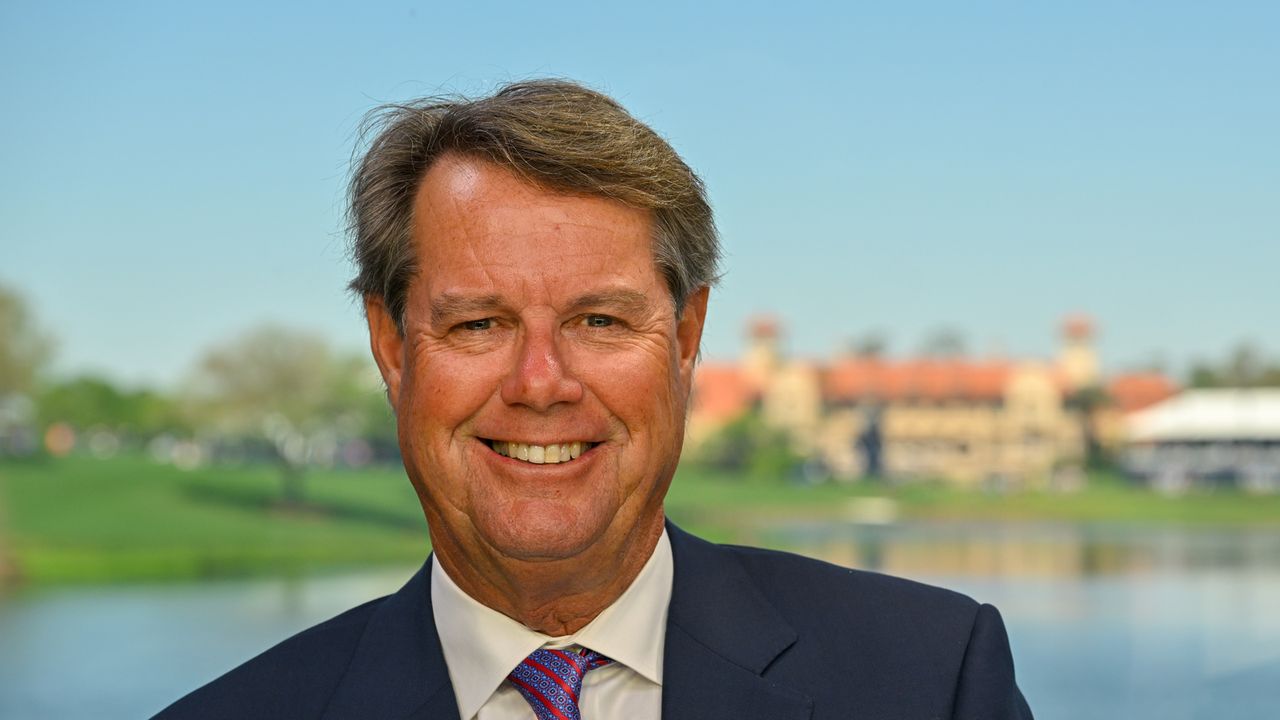 A close-up head shot of Paul Azinger