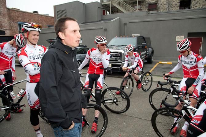Director Omer Kem lays out the days ride in the hotel parking lot.