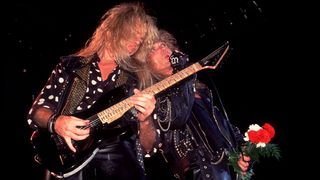 Rock musicians Adrian Vandenberg (left) and David Coverdale, both of the group Whitesnake, perform onstage at the Alpine Valley Music Theater, East Troy, Wisconsin, May 28, 1990.
