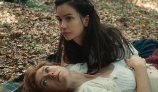 Katherine Waterson and Vanessa Kirby embrace with concern in The World To Come.