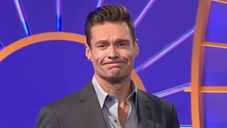 Ryan Seacrest pressing lips together after Bonus Round on Wheel of Fortune