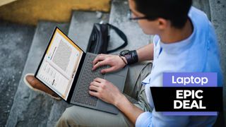 Dell Insprion 14 Plus laptop balanced on businessman's lap