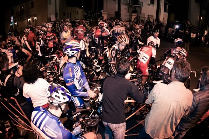 The elite men's field on the start line at the Old Pueblo Grand Prix in Tucson, Arizona.