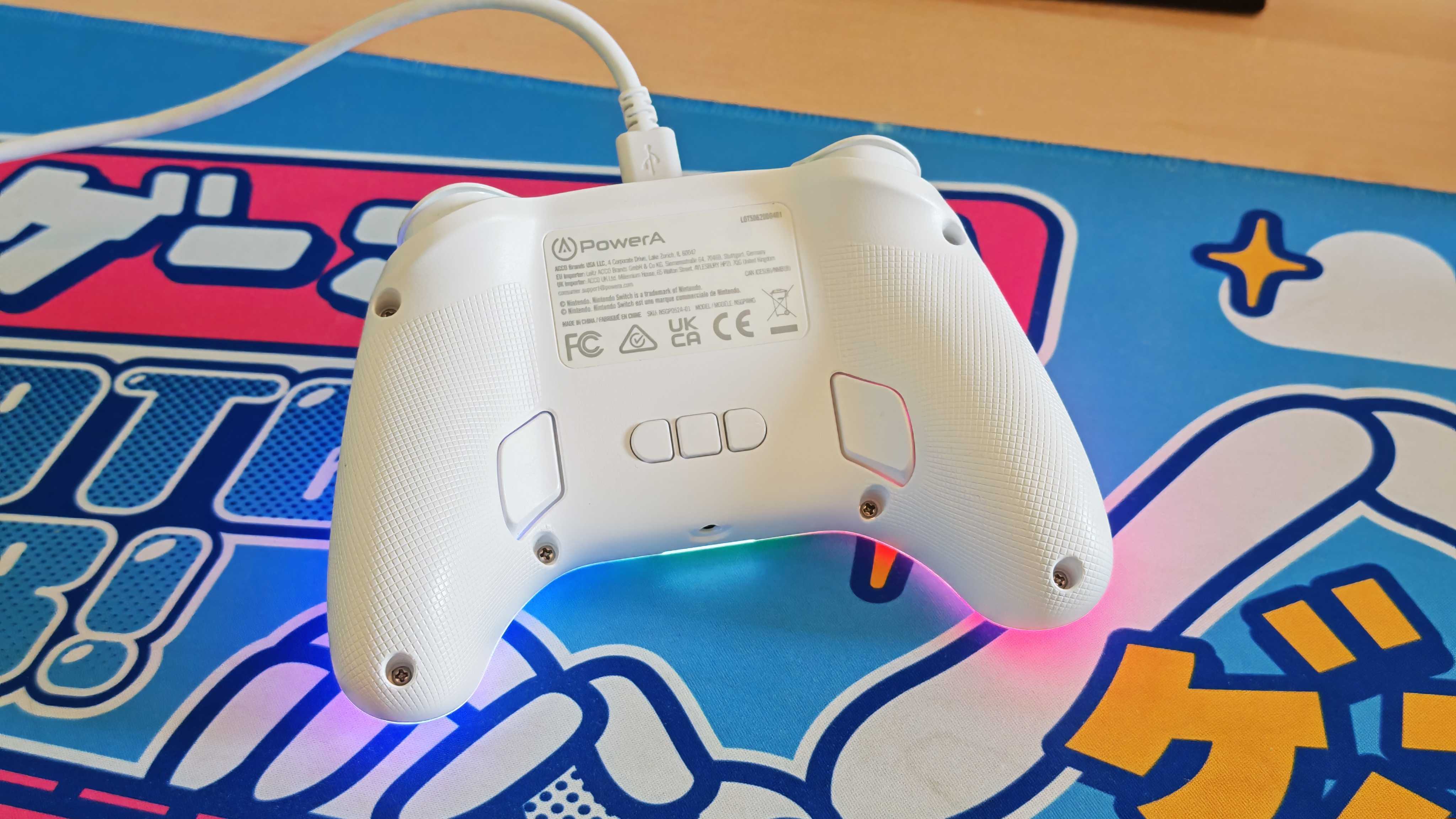 The PowerA Advantage Switch 2 Wired Controller on a bright blue mouse mat.