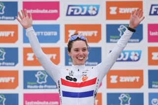 Team DSM-Firmenich PostNL's British rider Pfeiffer Georgi celebrates on the podium after placing third in the fourth edition of the women's Paris-Roubaix one-day classic cycling race, 148,5km between Denain and Roubaix, on April 6, 2024. (Photo by Francois LO PRESTI / AFP) / â€œThe erroneous mention[s] appearing in the metadata of this photo by Francois LO PRESTI has been modified in AFP systems in the following manner: [placing third] instead of [placing second]. Please immediately remove the erroneous mention[s] from all your online services and delete it (them) from your servers. If you have been authorized by AFP to distribute it (them) to third parties, please ensure that the same actions are carried out by them. Failure to promptly comply with these instructions will entail liability on your part for any continued or post notification usage. Therefore we thank you very much for all your attention and prompt action. We are sorry for the inconvenience this notification may cause and remain at your disposal for any further information you may require.â€