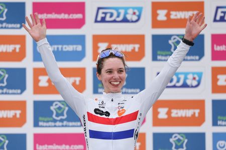 Team DSM-Firmenich PostNL's British rider Pfeiffer Georgi celebrates on the podium after placing third in the fourth edition of the women's Paris-Roubaix one-day classic cycling race, 148,5km between Denain and Roubaix, on April 6, 2024. (Photo by Francois LO PRESTI / AFP) / &acirc;The erroneous mention[s] appearing in the metadata of this photo by Francois LO PRESTI has been modified in AFP systems in the following manner: [placing third] instead of [placing second]. Please immediately remove the erroneous mention[s] from all your online services and delete it (them) from your servers. If you have been authorized by AFP to distribute it (them) to third parties, please ensure that the same actions are carried out by them. Failure to promptly comply with these instructions will entail liability on your part for any continued or post notification usage. Therefore we thank you very much for all your attention and prompt action. We are sorry for the inconvenience this notification may cause and remain at your disposal for any further information you may require.&acirc;