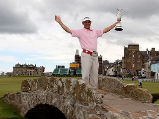 louis oosthuizen on the swilcan bridge with the claret jug