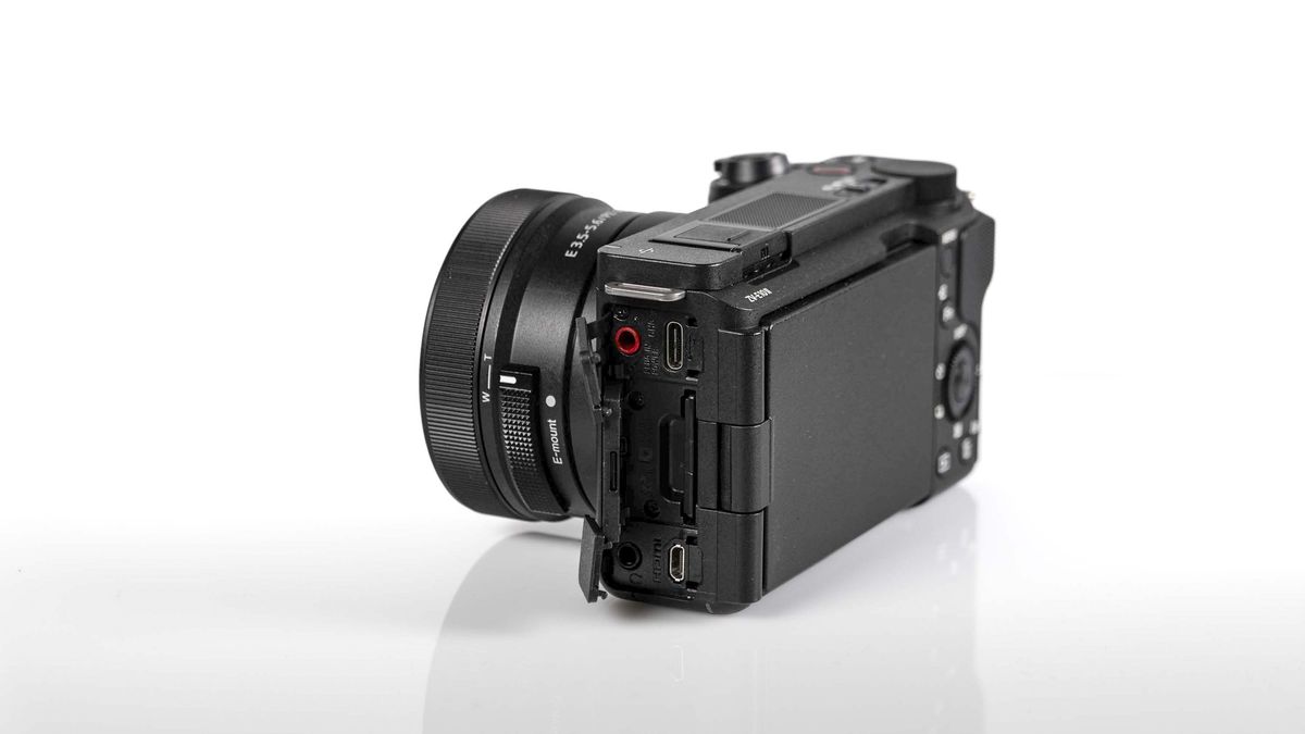 Sony ZV-E10 II on reflective surface and white background