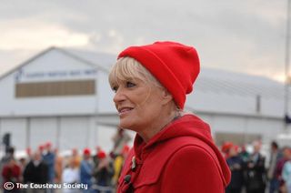 Francine Cousteau in her husband Jacque's famous red hat. credit: The Cousteau Society