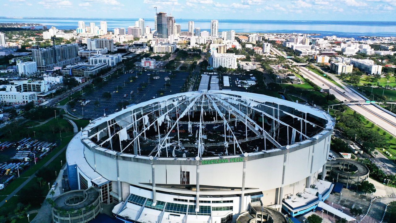 overhead drone shot of Tropicana Field after a hurricane ripped off the stadium&#039;s roof