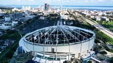 overhead drone shot of Tropicana Field after a hurricane ripped off the stadium's roof