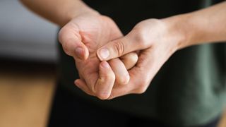 A close up of someone cracking their fingers