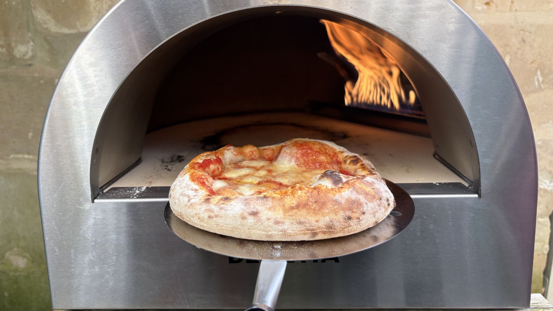 Testing the Delivita Flow Dual Fuel Pizza Oven by cooking a pizza