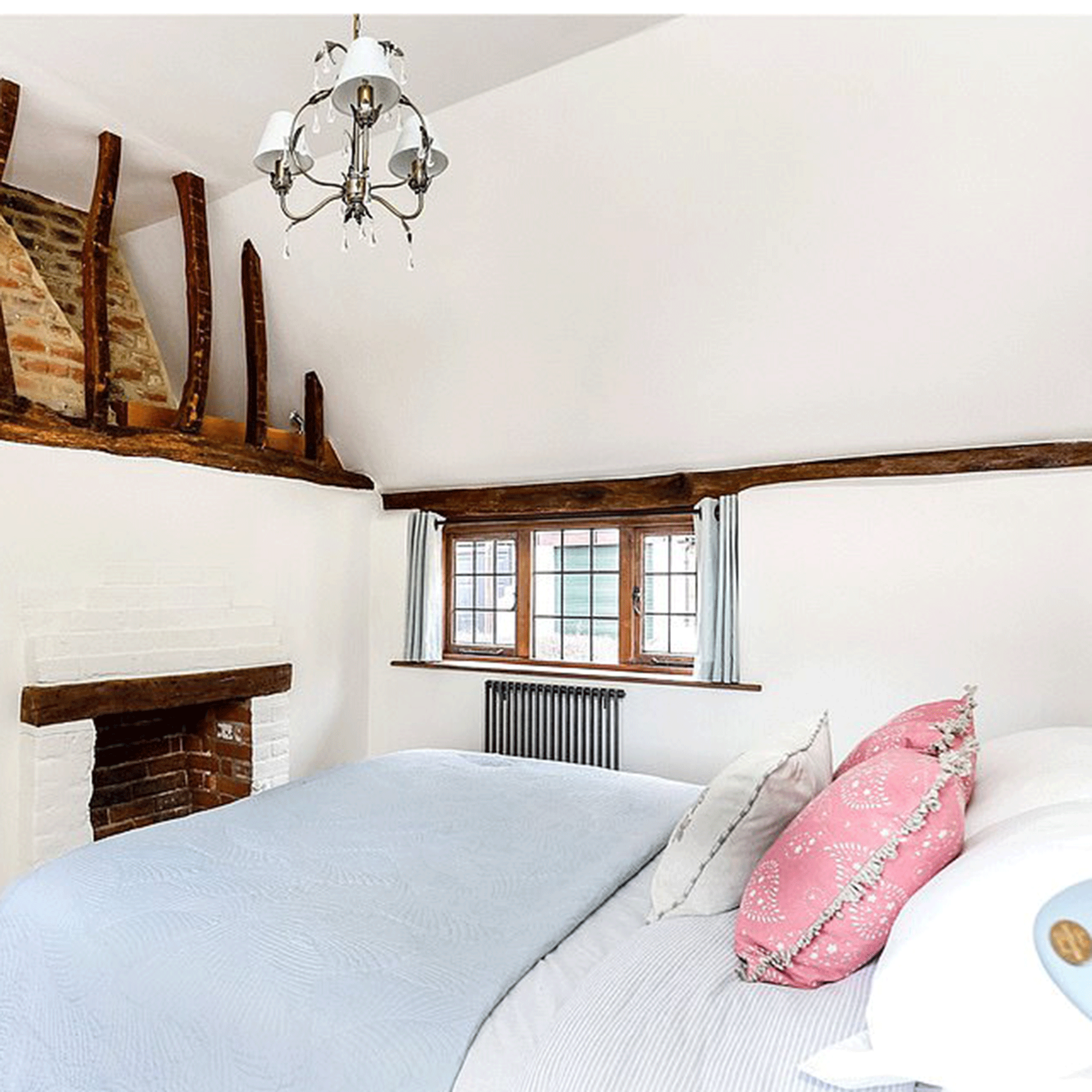 Holiday cottage white bedroom