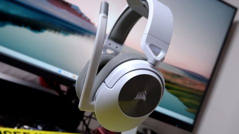 Corsair HS55 Wireless gaming headset in front of a monitor.
