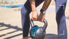 Woman holding 6kg kettlebell in a deadlift stance, representing strength training for women