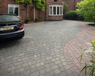 Block paving driveway with two color stones