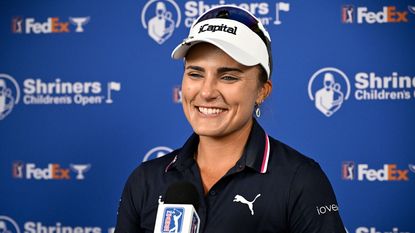 Lexi Thompson smiles during her interview