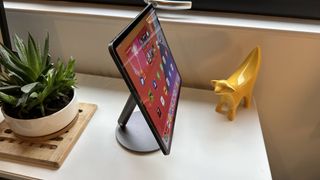 Benks Infinity Pro Magnetic iPad Stand on a white dresser