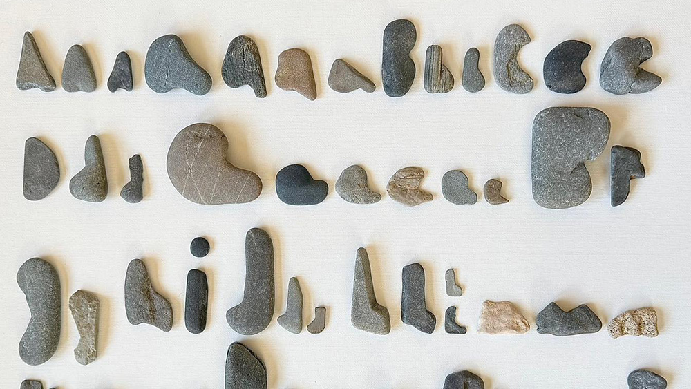 An rock alphabet made from found stones