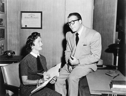 Noel Neill and George Reeves as Lois Lane and Clark Kent.