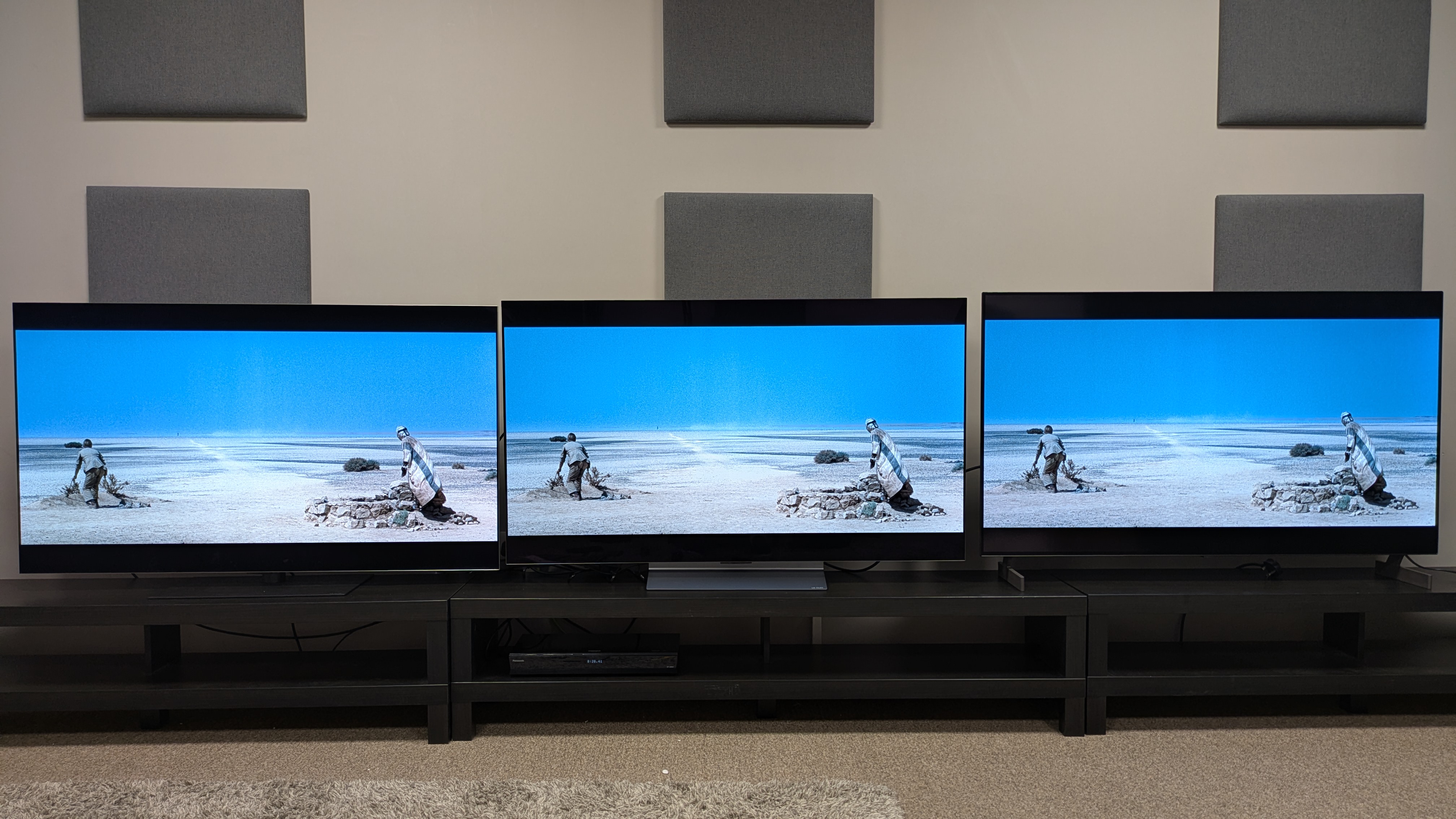LG G6 (left) vs LG C6 (middle) vs LG B6E (right) showing Lawrence and his guide in the white desert from Lawrence of Arabia. The G6's whites are brightest, with the most striking look