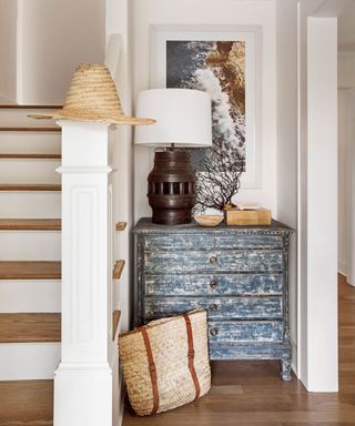 White entryway with wood accents
