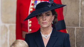 Kate Middleton honours Queen - Catherine, Princess of Wales, Princess Charlotte of Wales during the State Funeral of Queen Elizabeth II at Westminster Abbey on September 19, 2022 in London, England.