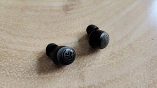 JLab Go Air Pop review: earbuds on a table