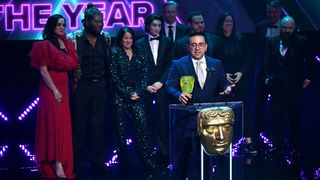 BAFTA Game Award winners; people accept an award