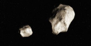 An artist's depiction of the asteroids 2019 PR2 and 2019 QR6 shortly after they separated.