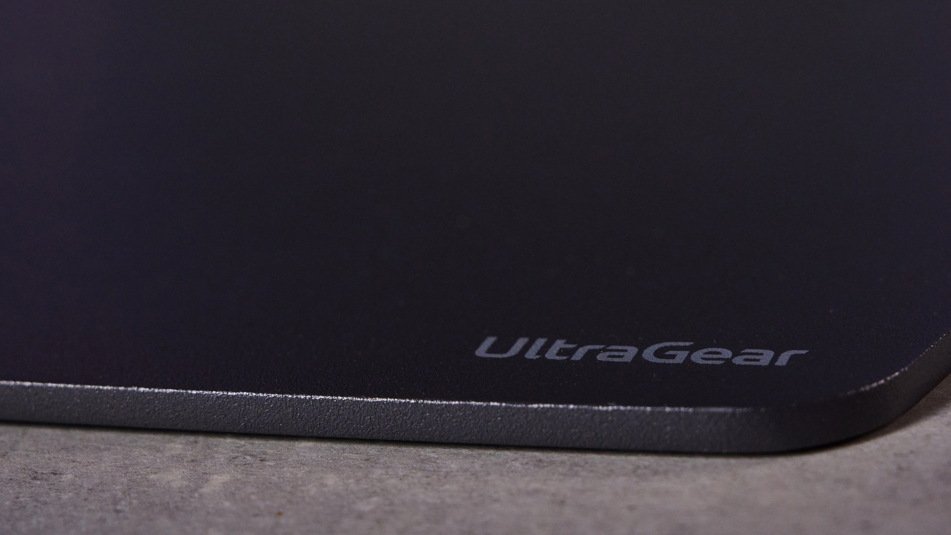 A black LG UltraGear 52G930B ultrawide 5K2K curved monitor