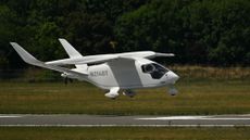 An electric airplane from U.S. company Beta Technologies prepares for landing.