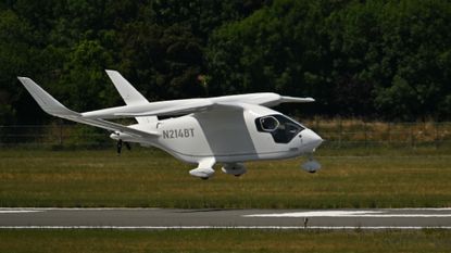An electric airplane from U.S. company Beta Technologies prepares for landing.
