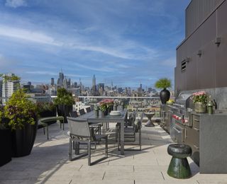 roof terrace with outdoor furniture and kitchen