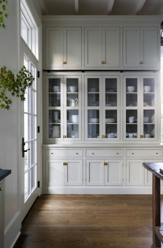 A kitchen painted ivory tones