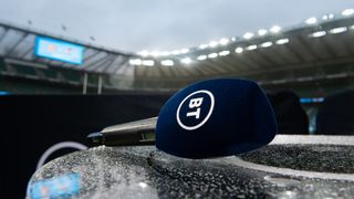 BT Sport microphone on a table pitchside at football stadium